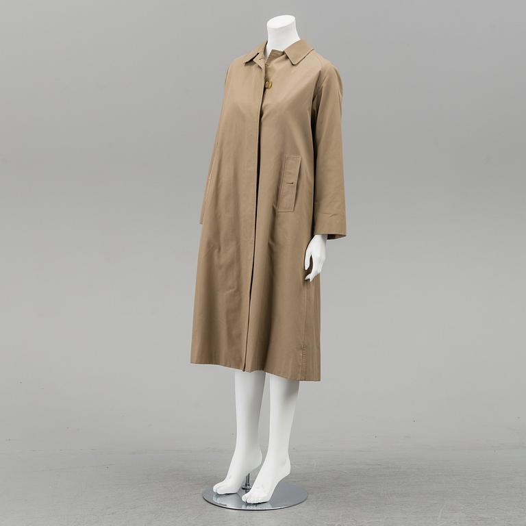 A Burberry trench coat with lining size 10.