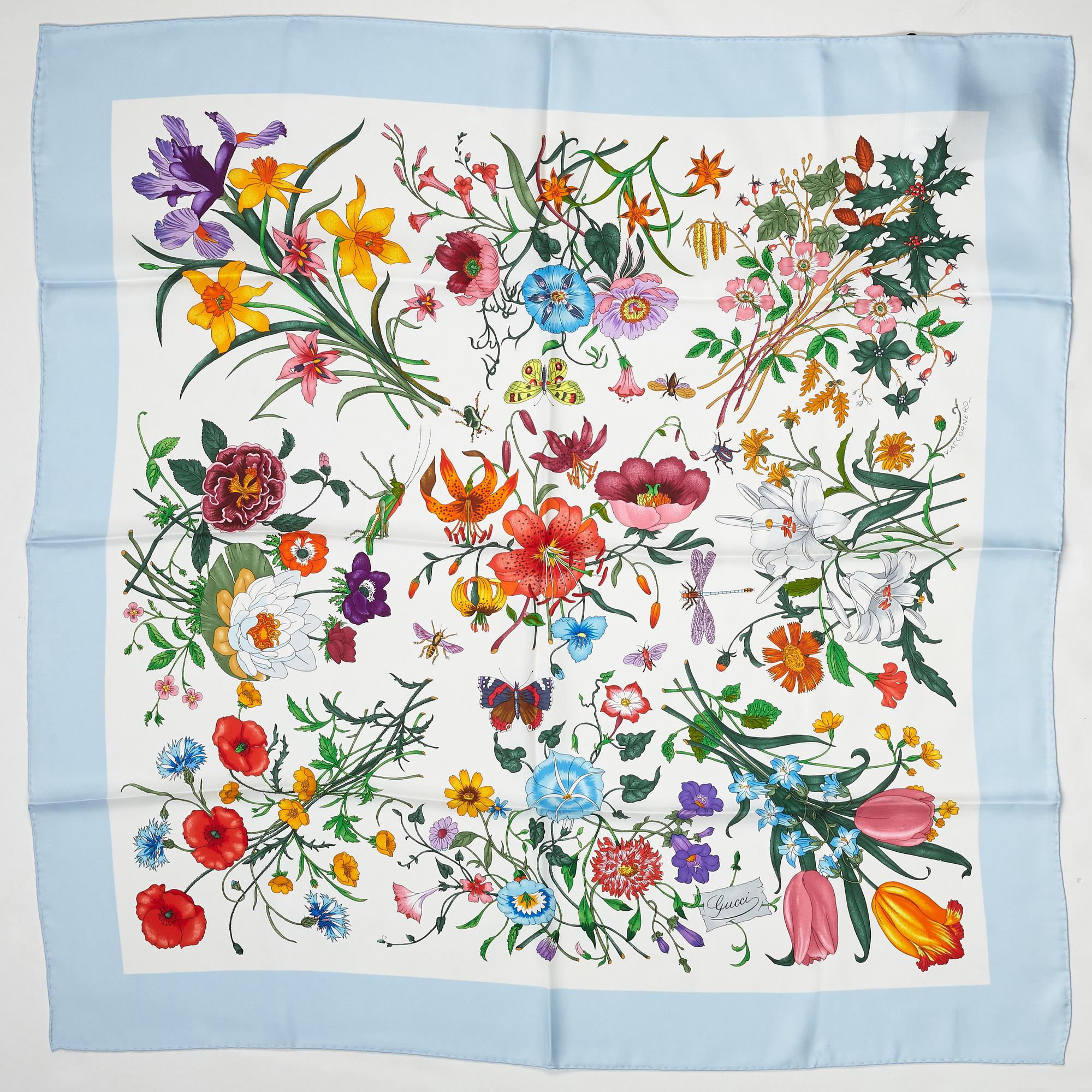 Gucci, a 'Flora' twill silk scarf.
