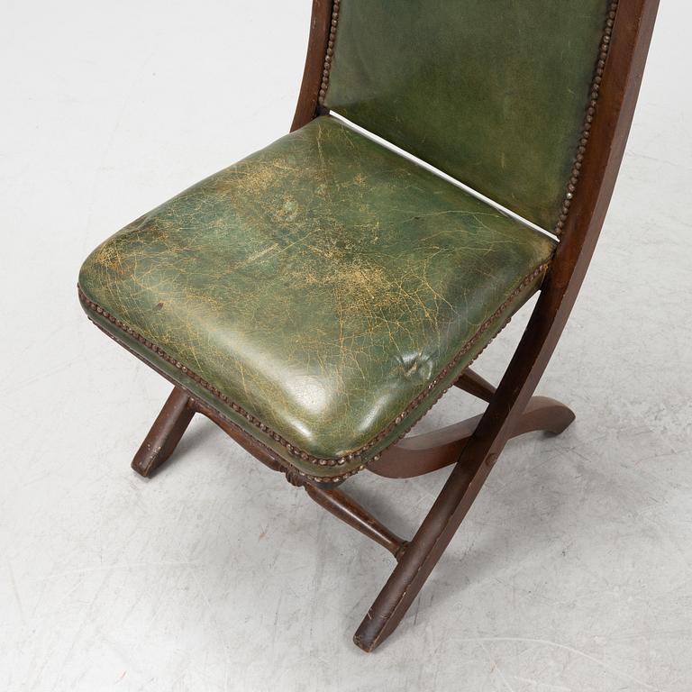 A set of five mahogany and leather upholstered chairs, England, second half of the 20th Century.