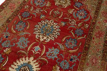 A Qum carpet, Central Persia, c. 310 x 190 cm.