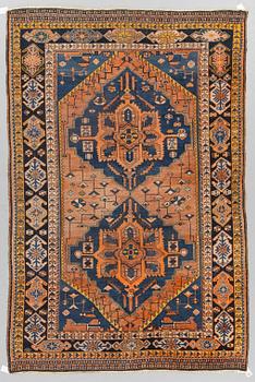 An oriental carpet, around 278 x 182 cm.