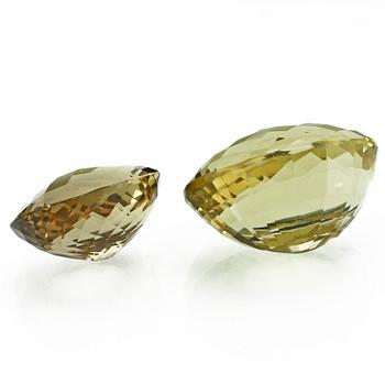 ÄDELSTENAR, 2 st, lemon quartz, 67.4 ct samt citrin, 31.55 ct, fasettslipade, 1900/2000-tal.