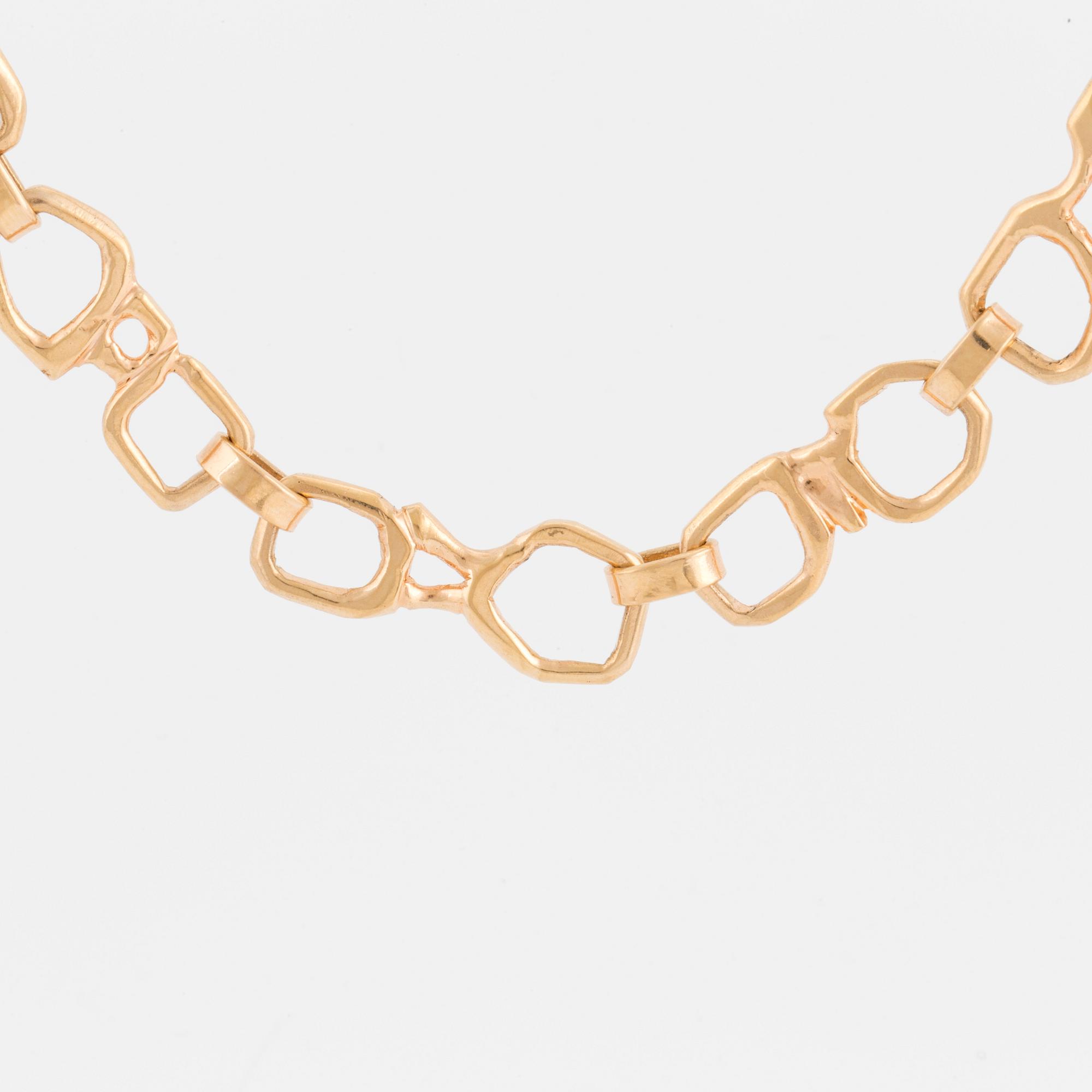 A fancy-link necklace.