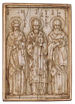 A probabaly Byzantine (Middle Ages to 1453) ivory icon/relief depicting Basileios, Chrysostomus and Gregorius.