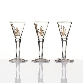 A set of six glasses and a bottle, Sweden, 18th century with King Gustavus IIIs monogram.