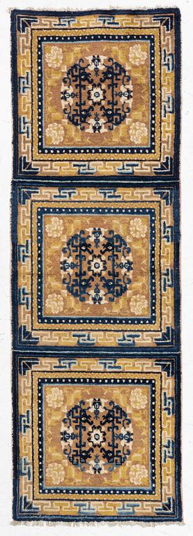 An antique Ningxia meditation rug, north west China, c 189 x 63 cm.