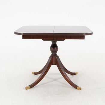AN English mahogany dining table later part of the 20th century.
