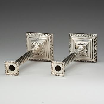 A pair of English silver candlesticks, possibly of Andrew Fogelberg, London 1766.