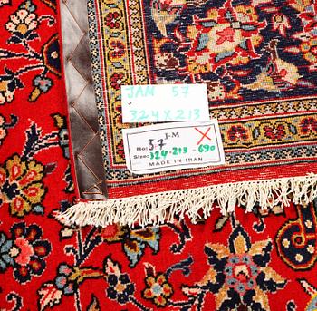 A Kashan carpet, c. 324 x 213 cm.