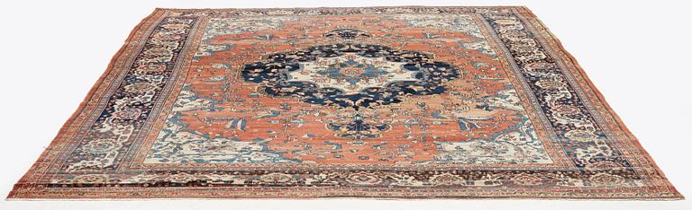 An Antique Sarouk carpet, West Persia, c. 353 x 260 cm.