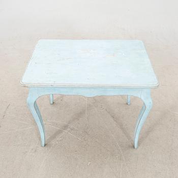 A painted early 1900s Rococo style table.