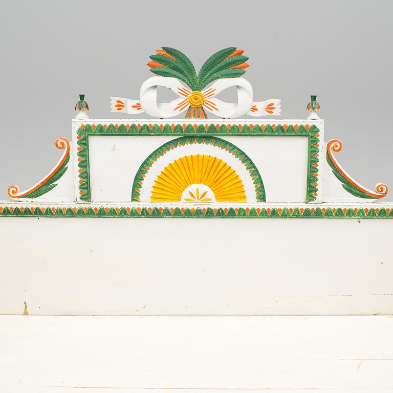 A early 19th century Swedish folk art folding bed from Forsa in Hälsingland.