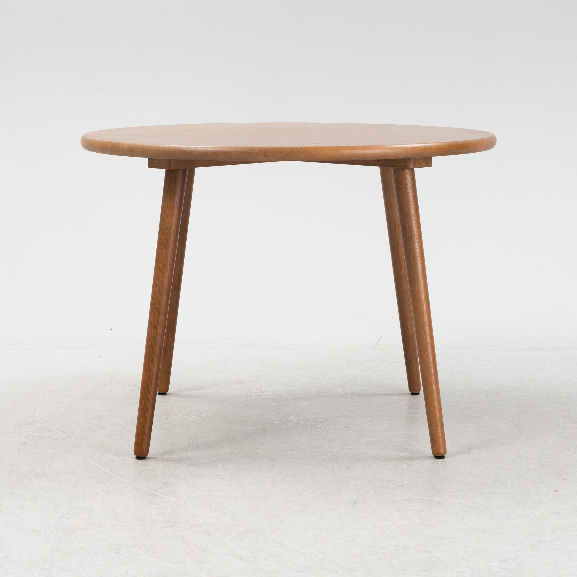 Jonas Lindvall, a stained oak dining table for Stolab.
