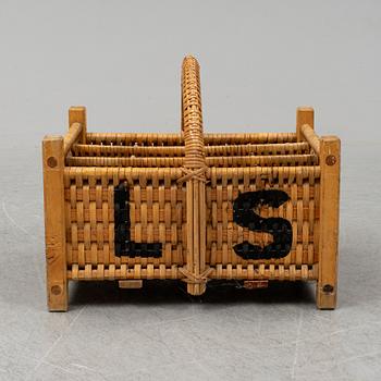 A rattan bottle basket.