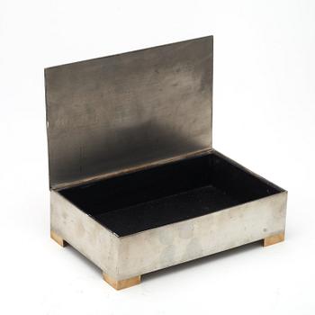 FIRMA SVENSKT TENN, ask för tändstickor och cigaretter, askfat, skrin samt ljusstake, Stockholm 1928-30.
