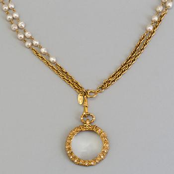 A necklace by CHANEL.