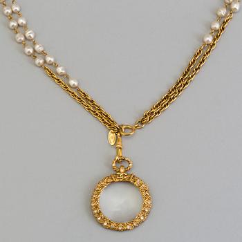 A necklace by CHANEL.