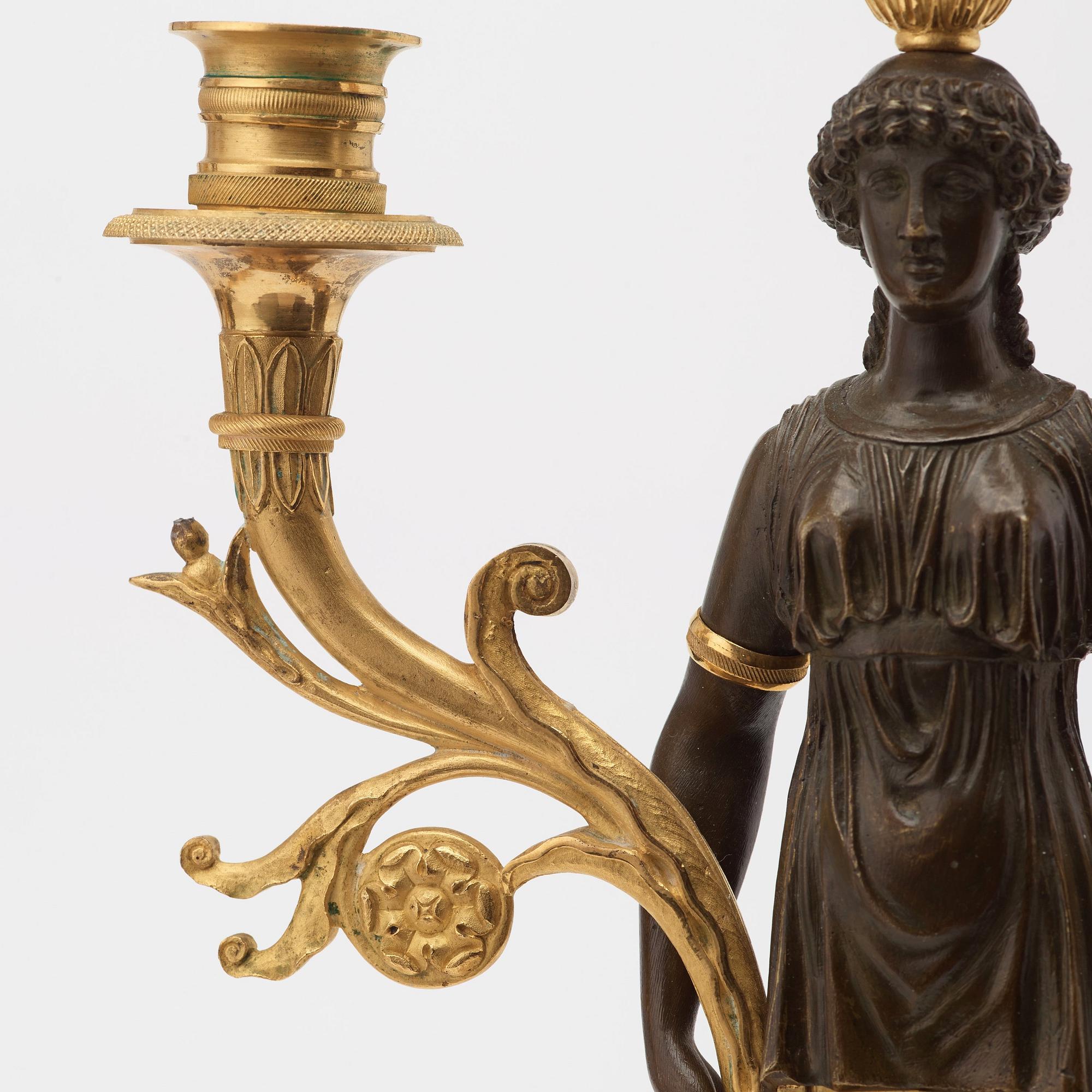 A pair of Swedish Empire early 19th century three-light candelabra.