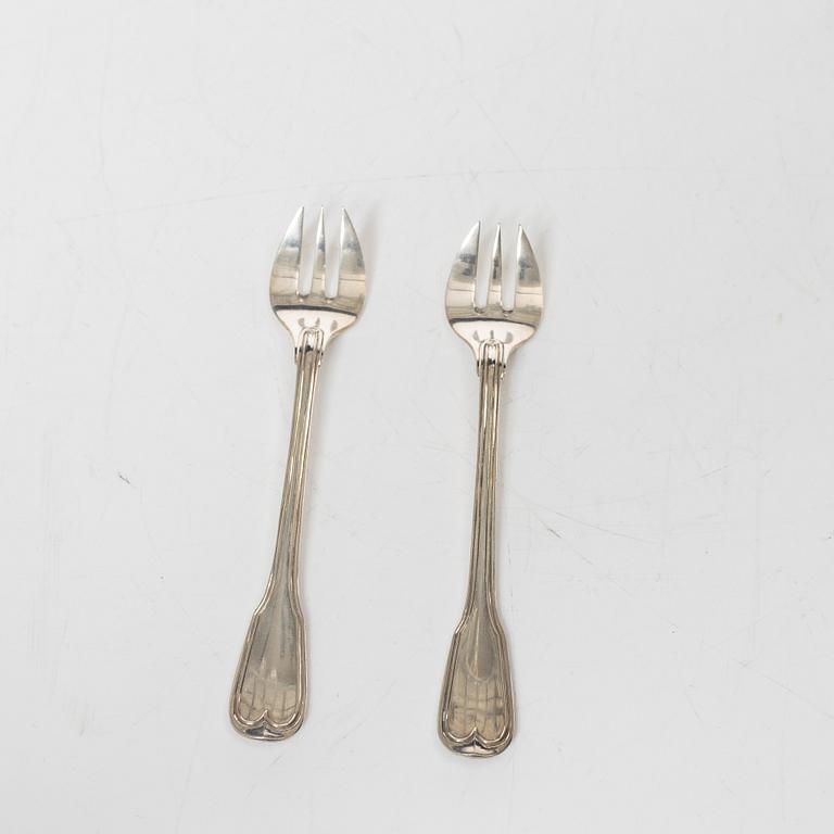 Ostrich forks, 12 pcs, silver 800, 20th Century.