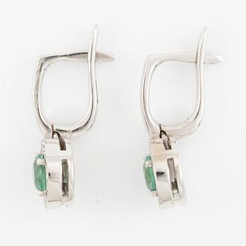 Earrings, 14K white gold with emeralds and brilliant-cut diamonds.