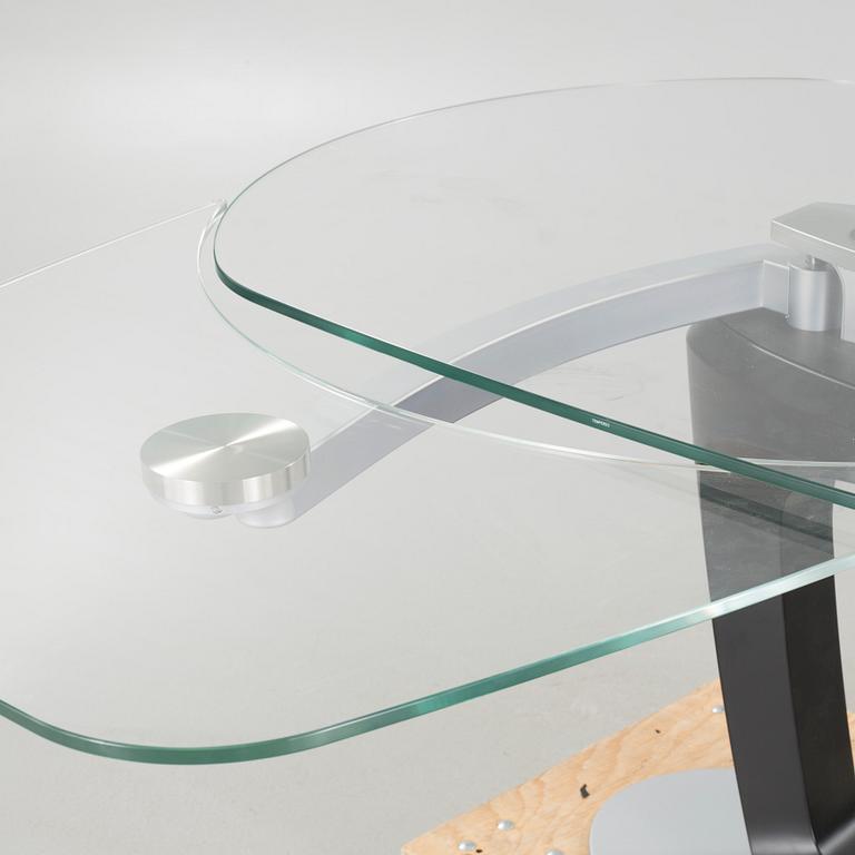 A 21st century "Orbital" dinner table by Pininfarina for Calligaris.