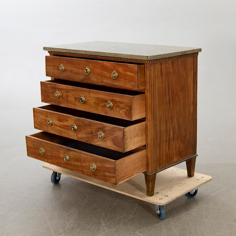 A late gustavian chest of drawers.