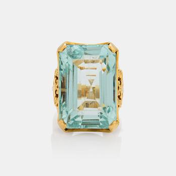 627. A circa 45.00 ct step cut aquamarine ring.