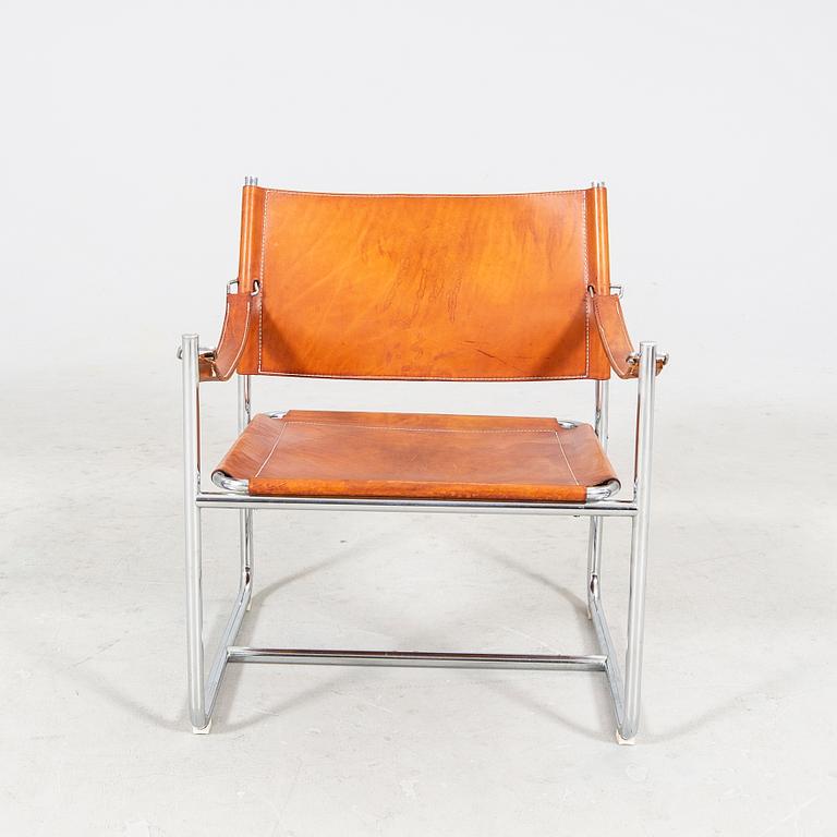 Karin Mobring, a late 20th century chrome and leather armchair from IKEA.