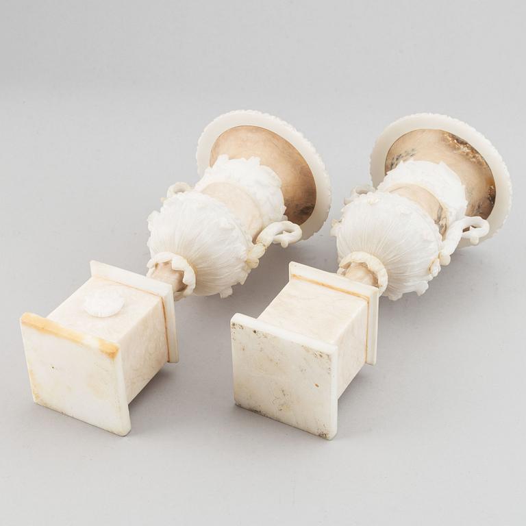 A pair of 20th century alabaster vases.