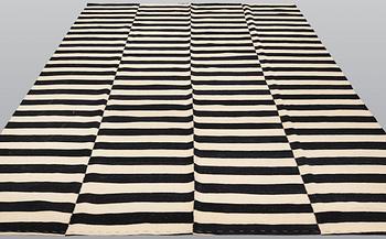 A carpet, flat weave, ca 288 x 210 cm.