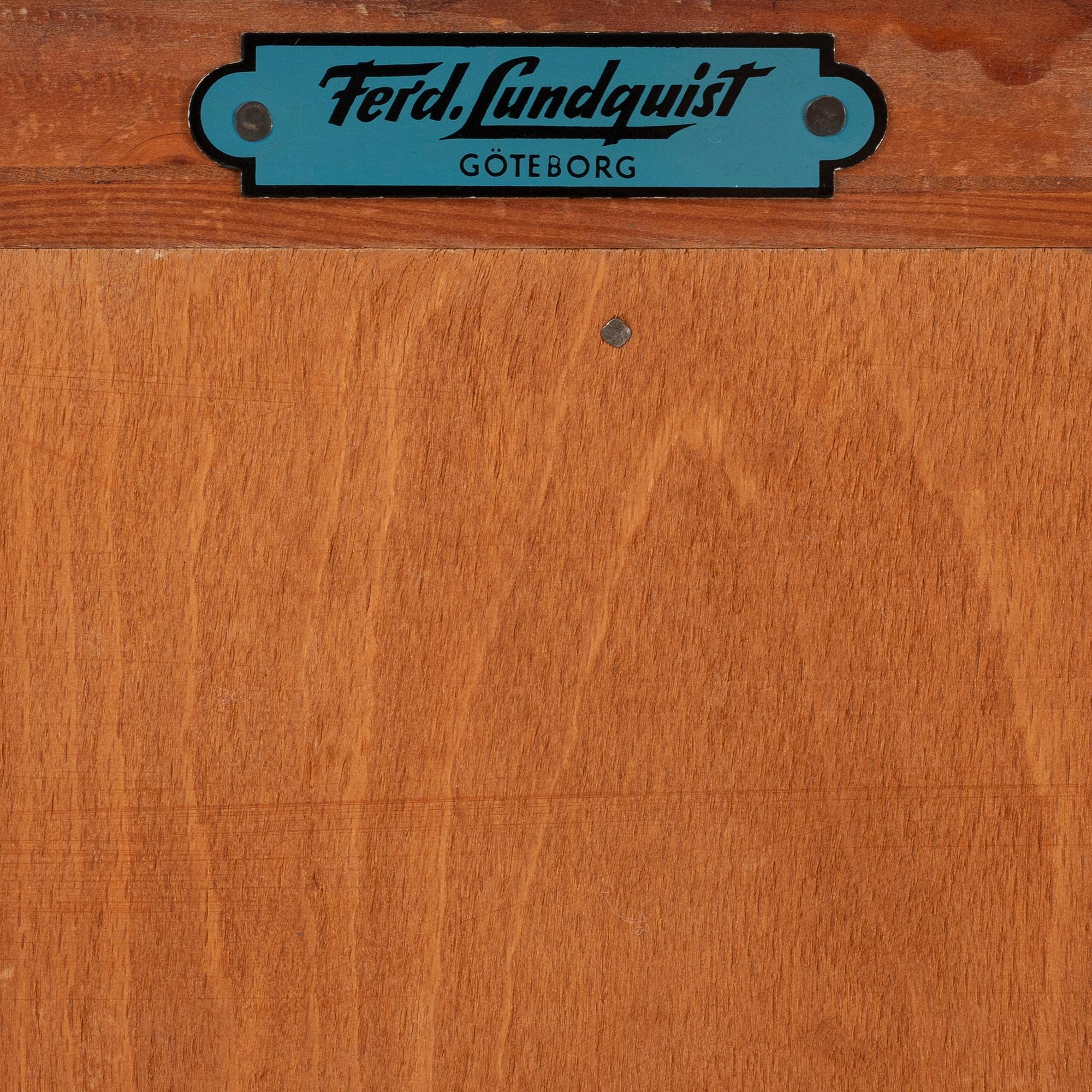 A mahogany veneered cabinet, Ferdinand Lundquist, Gothenburg, mid 20th Century.
