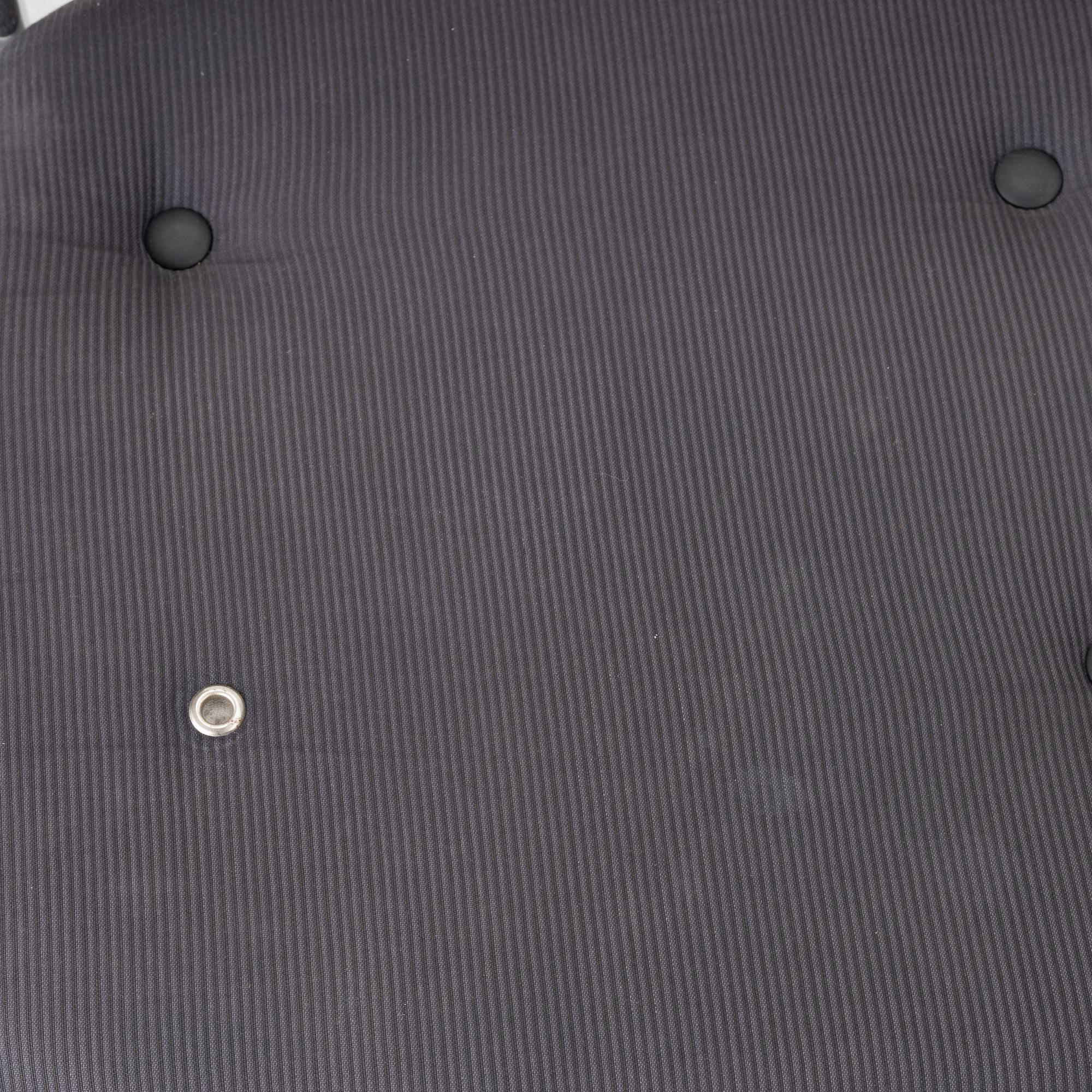 Vico Magistretti, a "Shine" dining table with twelve chairs, De Padova, Italy, around the year 2000.