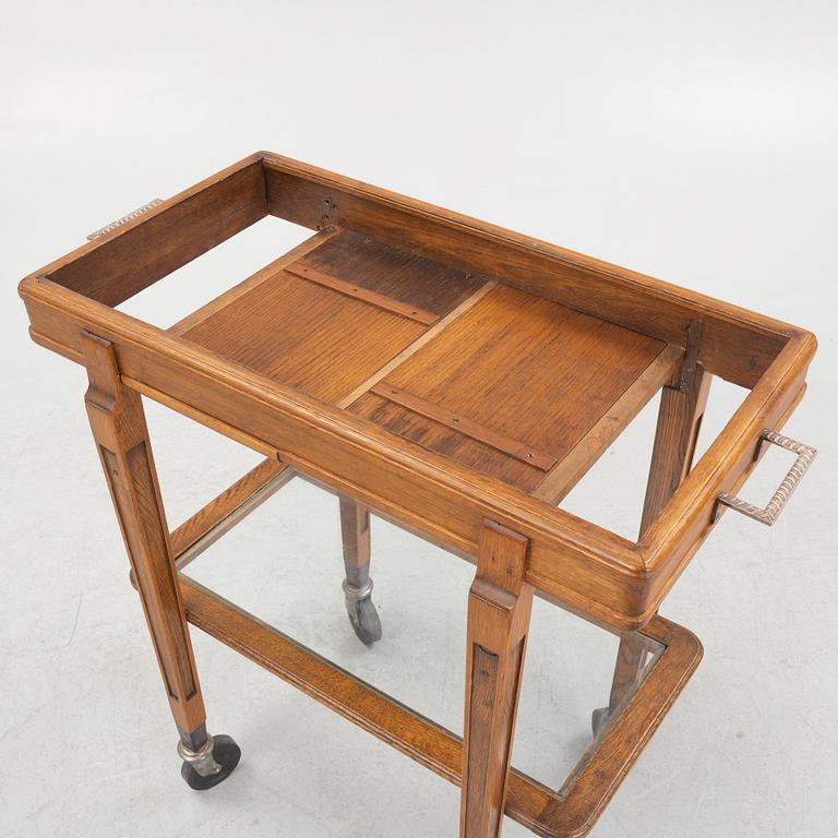 A restaurant serving trolley with silver plate dishes, first half of the/mid 20th century.
