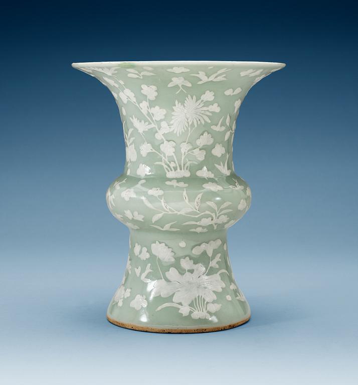 A celadon slip decorated vase, Qing dynasty, Kangxi (1662-1722).