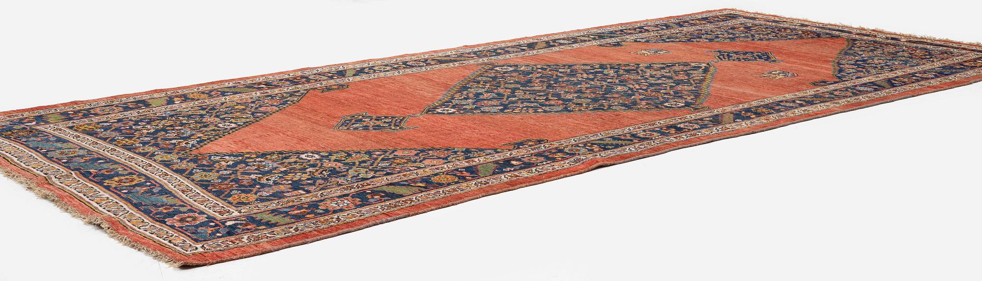 An antique Bidjar carpet, West Persia, c. 380 x 174 cm.