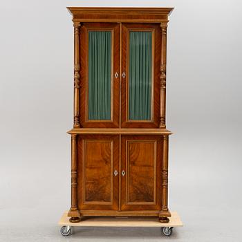 A book cabinet, around the year 1900.