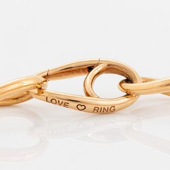 An 18K gold Ole Lynggaard "Love" necklace.