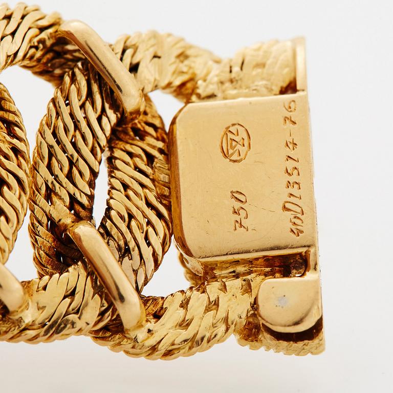 Georges L'Enfant an 18K gold demi parure comprising a necklace, a bracelet and a ring.