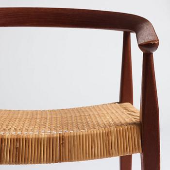 Nanna Ditzel, a pair of teak and rattan model 113 chairs, Poul Kold Savverk, Denmark, post 1955.