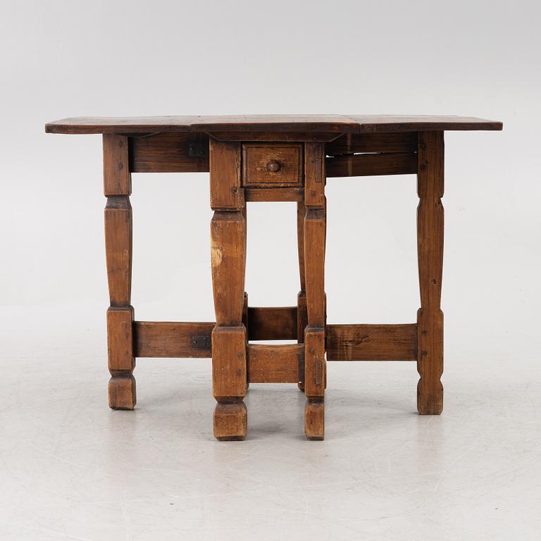 A drop-leaf table, 18th/19th Cc2entury.