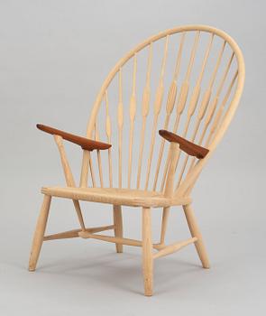 A Hans J Wegner ash and teak 'Peacock chair', by PP Møbler, Denmark.