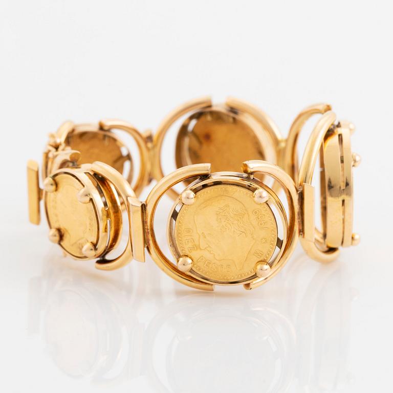 An 18K gold bracelet set with Mexican 22K gold coins.