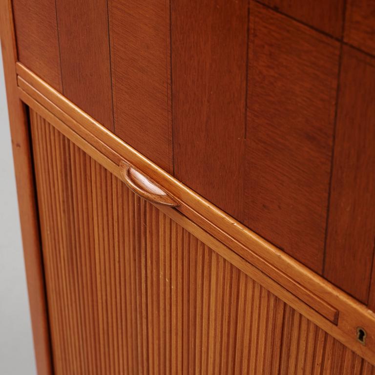 David Rosén, a mahogany and teak cabinet, for Stockholm's Association of Crafts, signed and dated 1959.