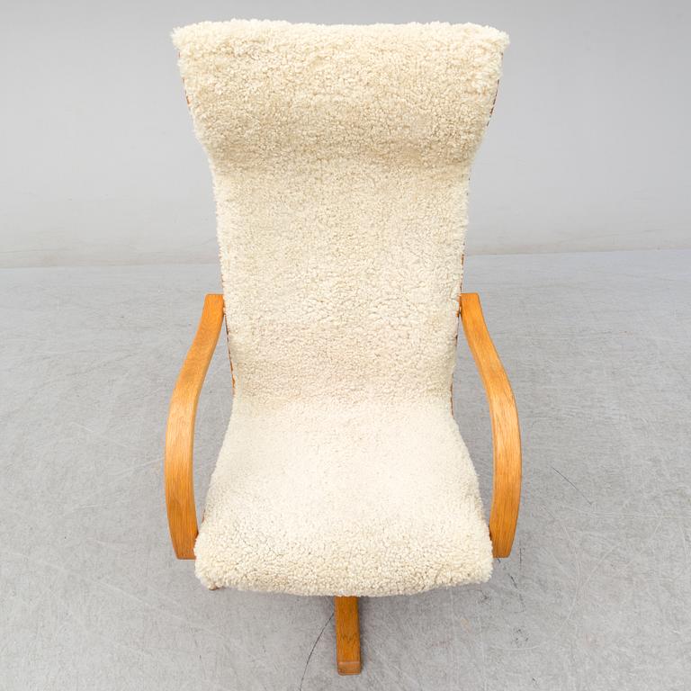 JAN EKSTRÖM, fåtölj med fotpall, "Gazell", Conform.