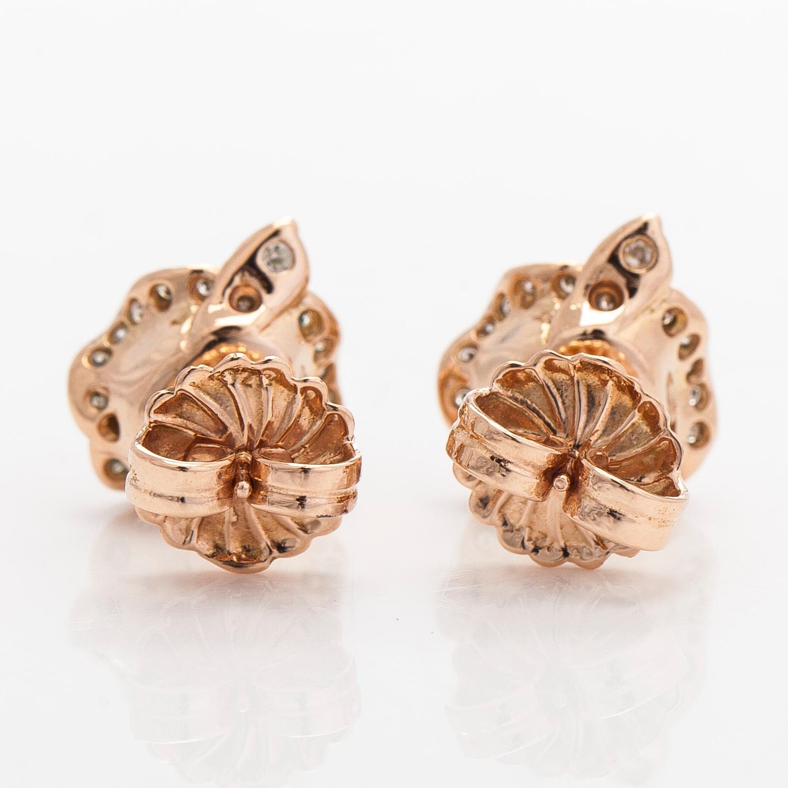 Korvakorut, 14K ruusukultaa ja briljanttihiottuja timantteja.