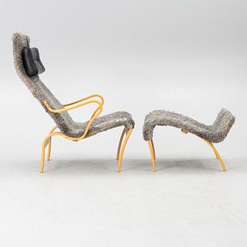Bruno Mathsson, a 'Miranda' armchair and ottoman, Bruno Mathsson International, Värnamo, 2001.