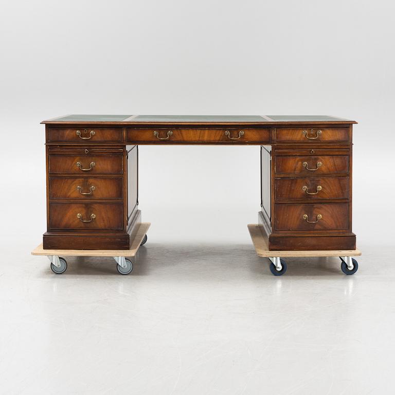 A 20th century Bevan Funnell Ltd Reprodux desk, England.