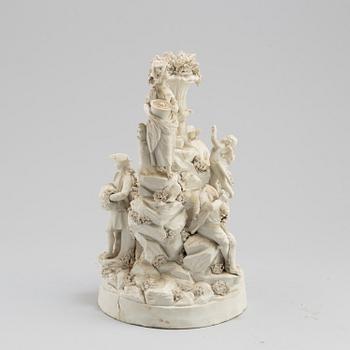 A porcelain figurine group circa 1900.