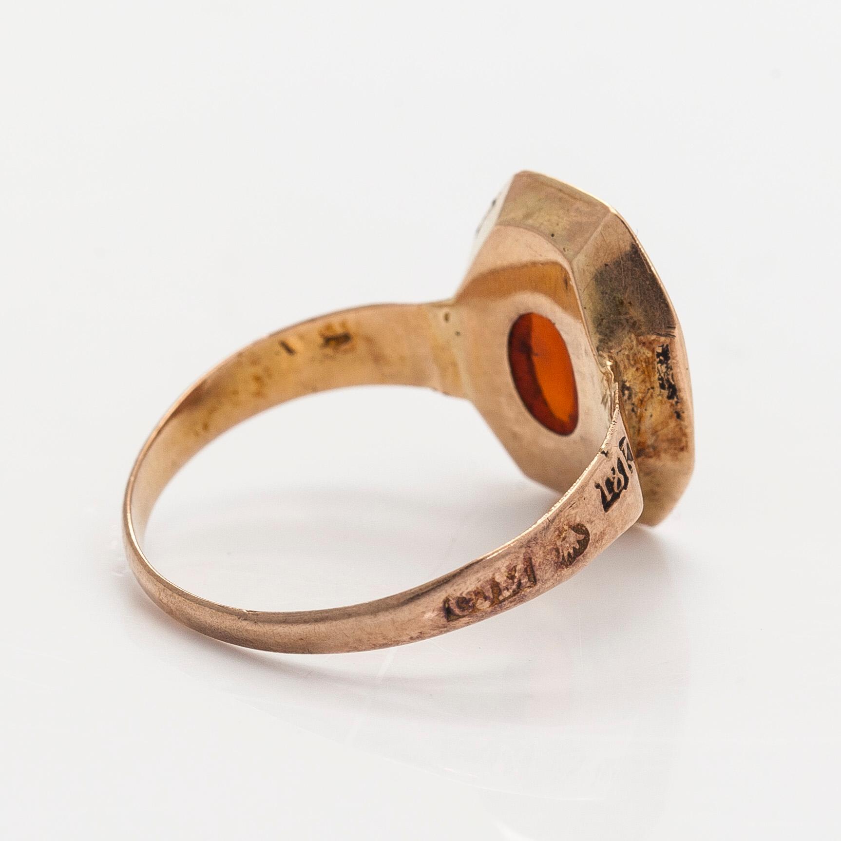Ring, engraved carnelian "Faith, hope and love", 18K gold, Carl Johan Martin, Pori mid-19th century.