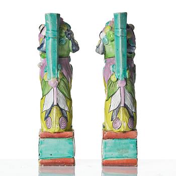 A pair of famille rose 'buddhist lion' joss stick holders, Qing dynasty, circa 1800.